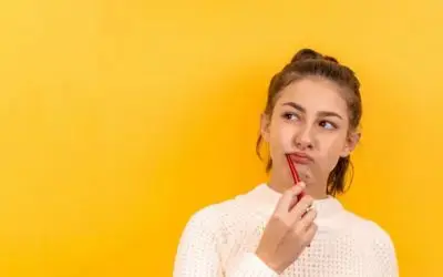 woman thinking while brushing teeth